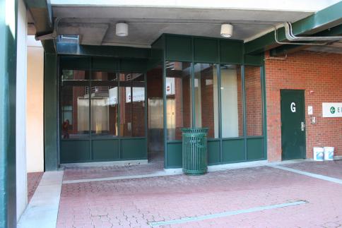 Ground floor entrance to parking deck elevator and staircase