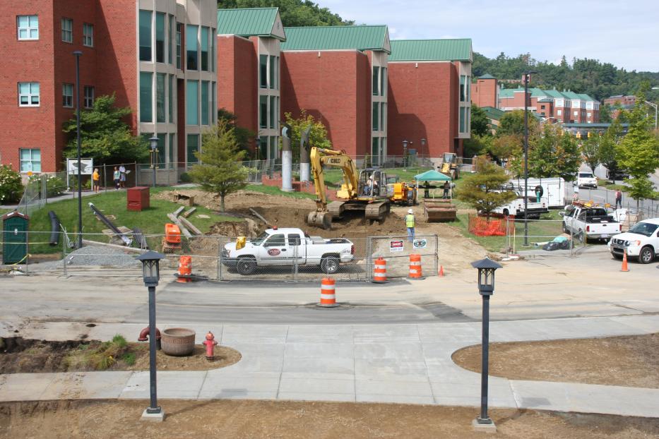 Crosswalk and roadway under construction outside of campus building