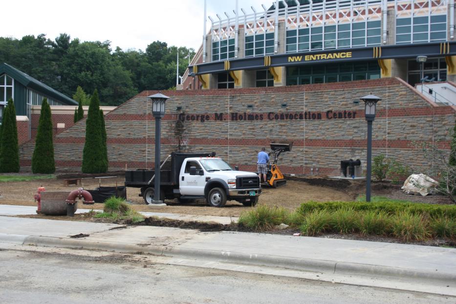 Large retaining wall outside of convocation center
