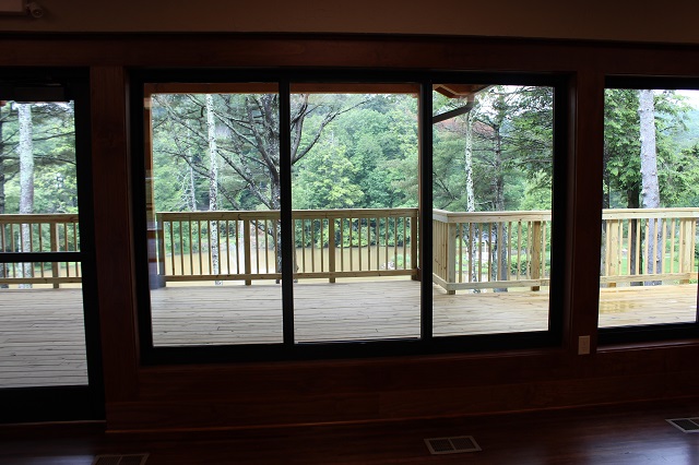 View of the back deck gathering area from inside the building