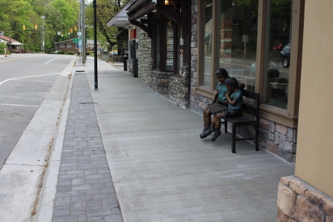 Pavers and sidewalk outside of multiple store fronts