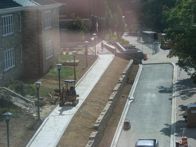 High ground view of project showing sidewalk and retaining wall