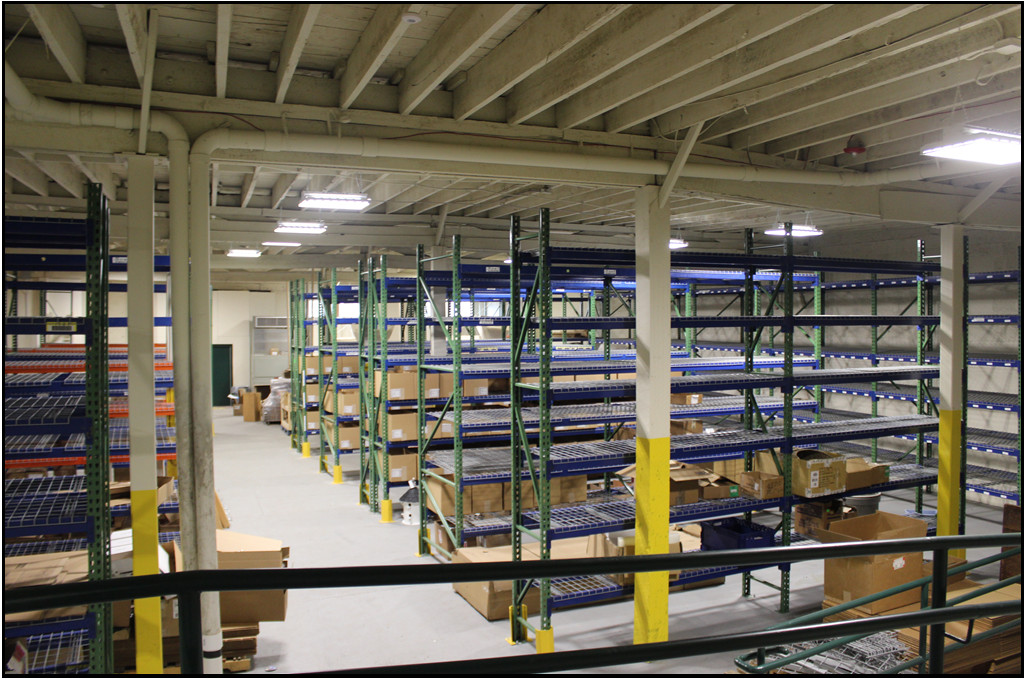 Warehouse with shelves holding store products